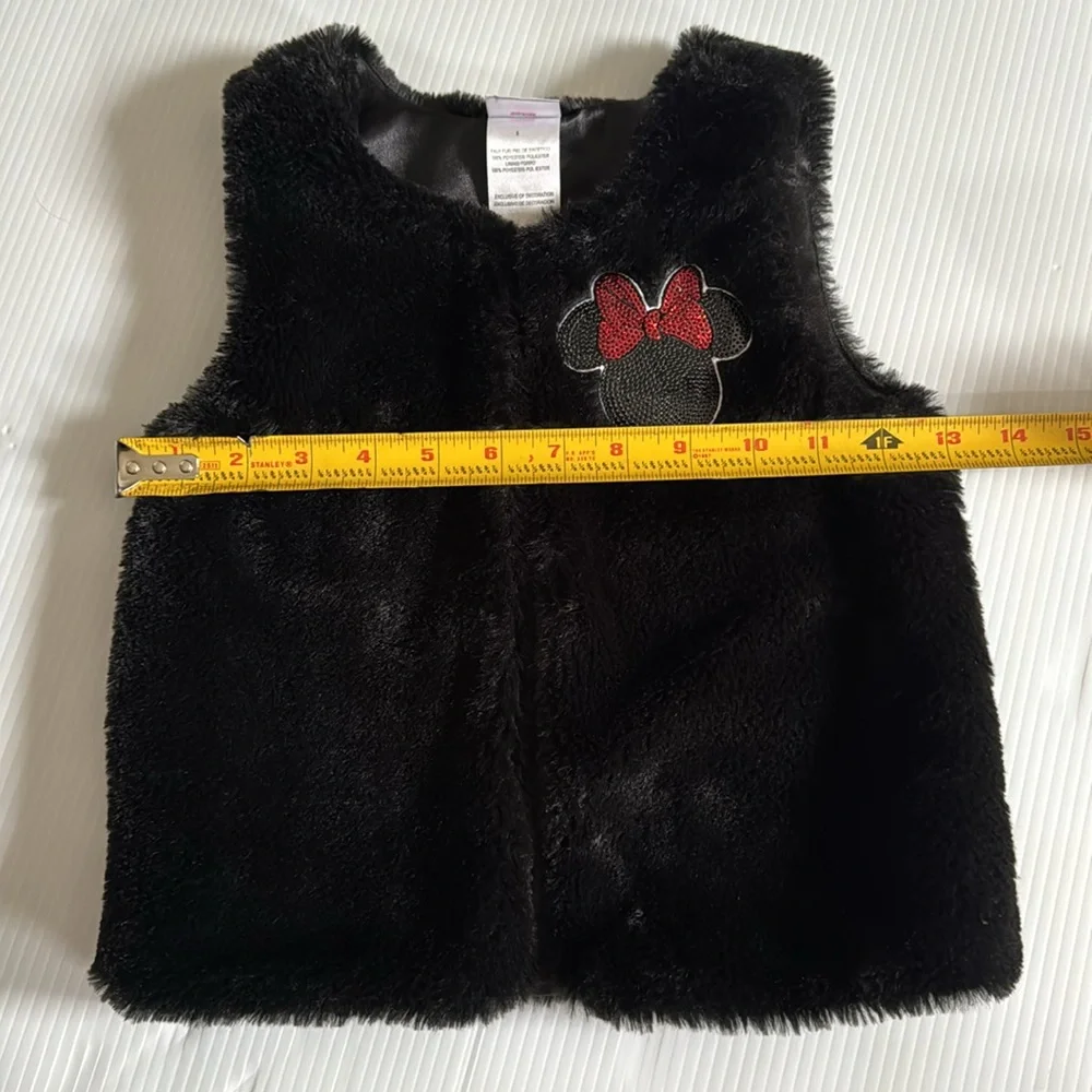 Disney Jr Black faux fur vest with black & red Minnie Mouse patch.  Size 5